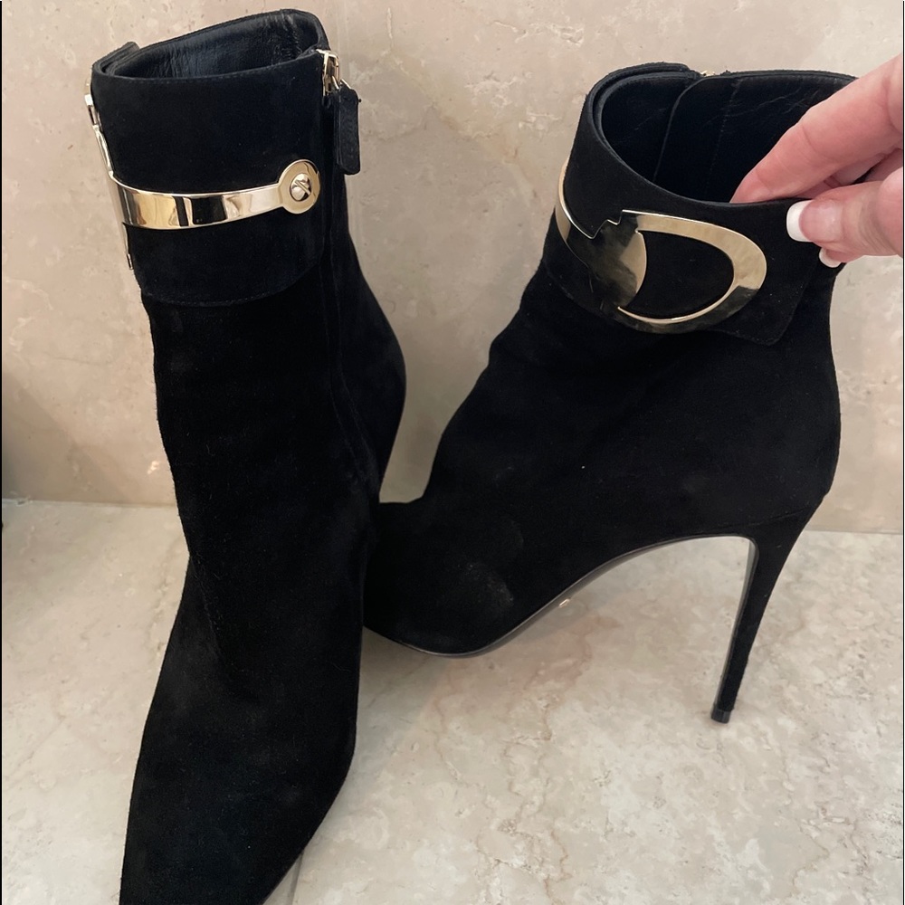 Black suede Gucci ankle boots. Edgy, yet sophisticated style.